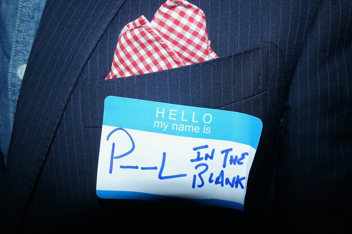 Name tag at a networking event. Photo by Philippe Yuan on Unsplash.